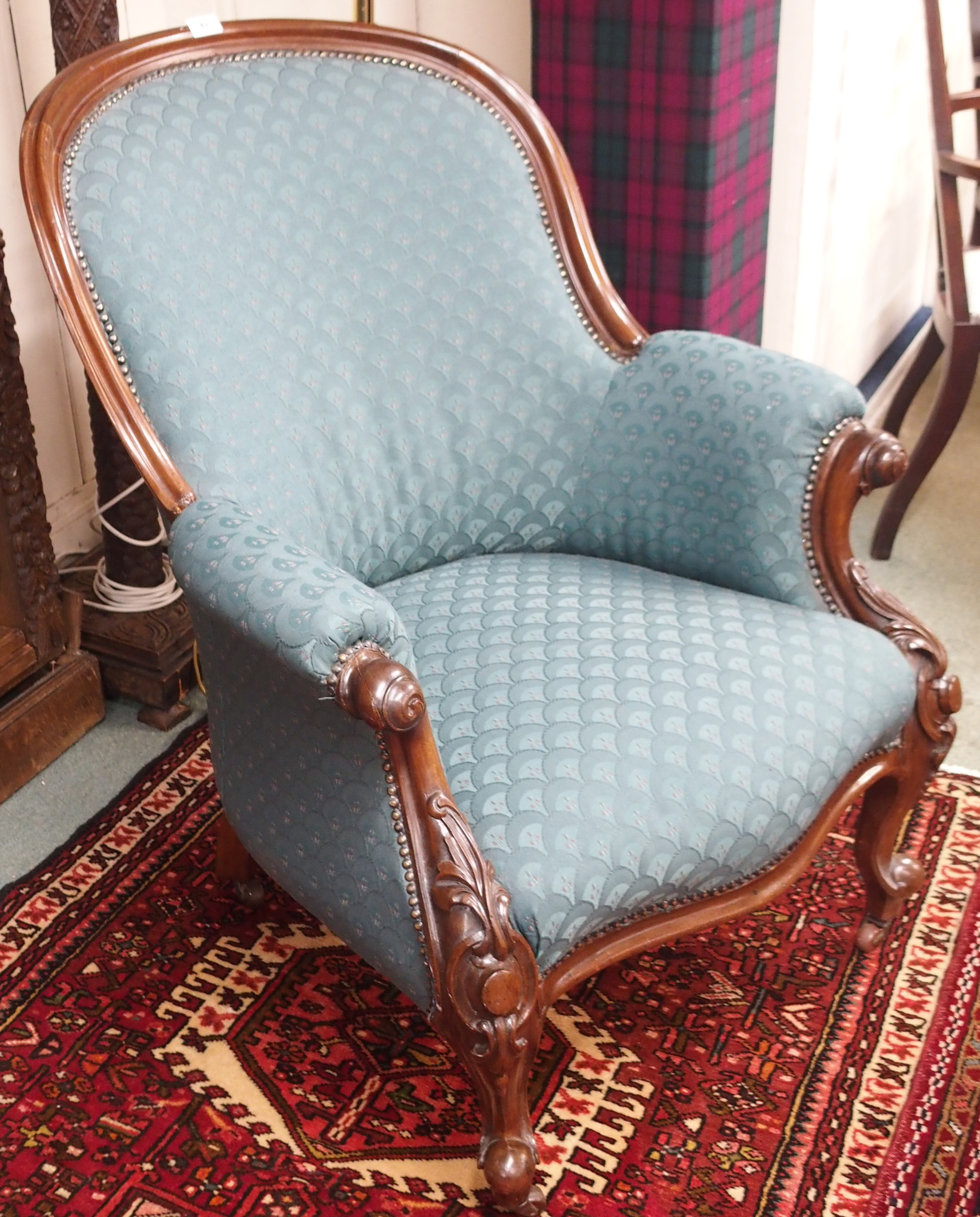 A Victorian mahogany carved armchair Condition Report: Available upon request