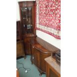 A reproduction mahogany two door cabinet and a corner cabinet (2) Condition Report: Available upon