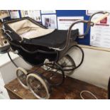 A black Marmet dolls pram Condition Report: Available upon request
