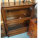 An oak sectional bookcase, 106cm high x 88cm wide x 37cm deep (def) Condition Report: Available upon