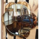 A frameless mirror, 56cm diameter Condition Report: Available upon request