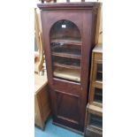 A cabinet with a single glazed door, 167cm high x 53cm wide x 28cm deep Condition Report: