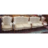 A pair of French style cream upholstered sofas, 98cm high x 140cm wide, matching chair and a