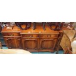 A reproduction mahogany breakfront sideboard, 83cm high x 188cm wide x 46cm deep Condition Report: