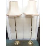 A pair of brass standard lamps and two table lamps (4) Condition Report: Available upon request