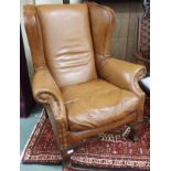 A John Lewis Compton tan leather wingback armchair Condition Report: Available upon request