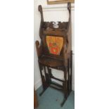 An oak writing desk with painted armorial panel, 145cm high x 46cm wide Condition Report: