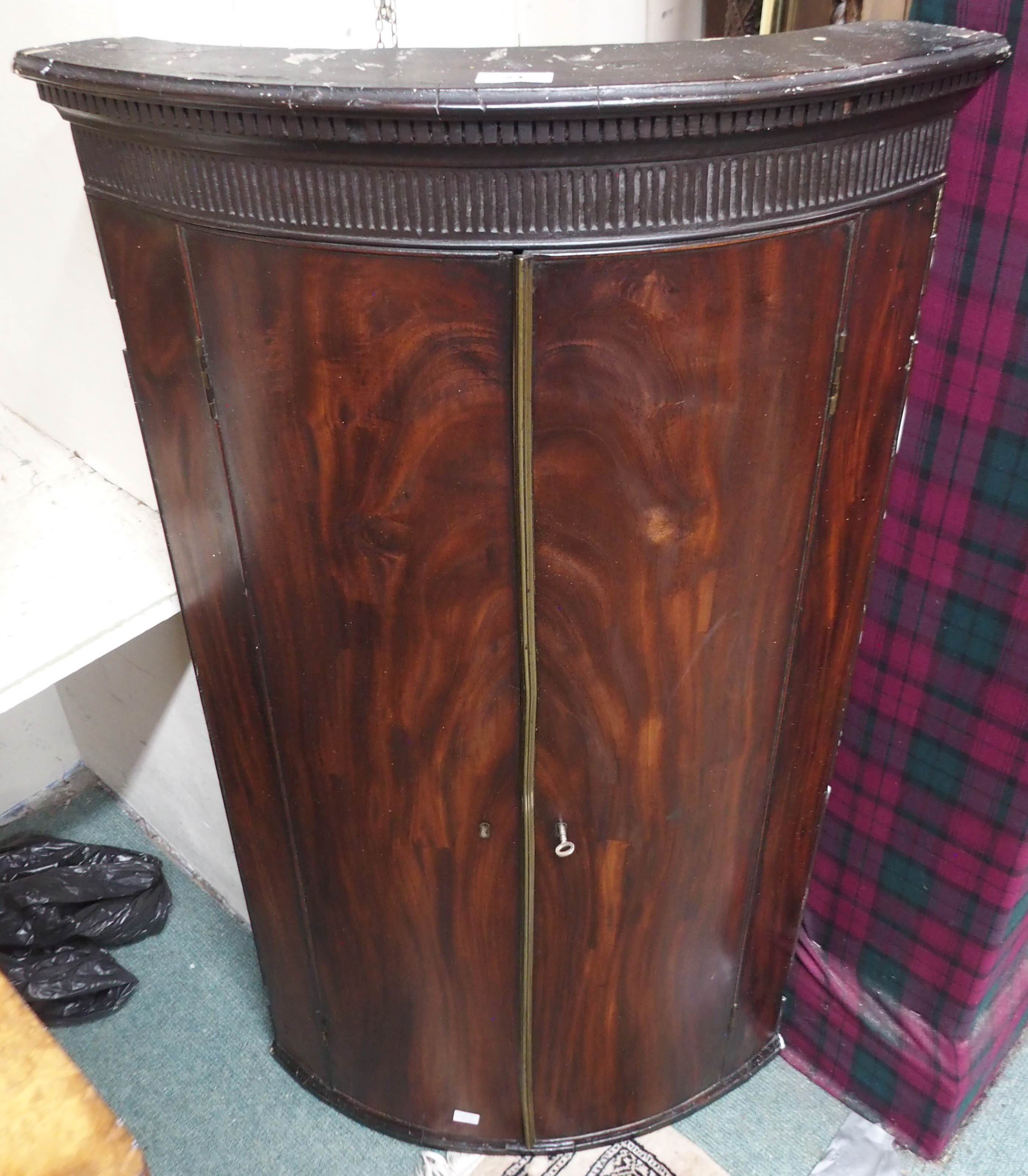 A 19th Century mahogany bow front corner cabinet, 104cm x 59cm Condition Report: Available upon
