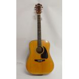 A Tennessee D-300 acoustic guitar with a dreadnought body serial number 91045 Condition Report: