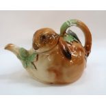 A Royal Doulton Bunnykins tepot, modelled as a rabbit. Condition Report: Has chips to spout and