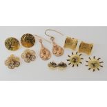 A collection of six pairs of 9ct and yellow metal earrings, approximate weight 14gms Condition