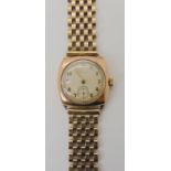 A 9ct gold Paramount gents watch and strap, dimensions of the case 2.7cm x 2.8cm, length of strap