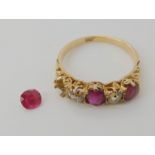 An 18ct gold faux ruby and diamond ring diamond content estimated approx 0.30cts, finger size R,