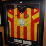 A Partick Thistle replica short-sleeved shirt, the front bearing numerous player, management