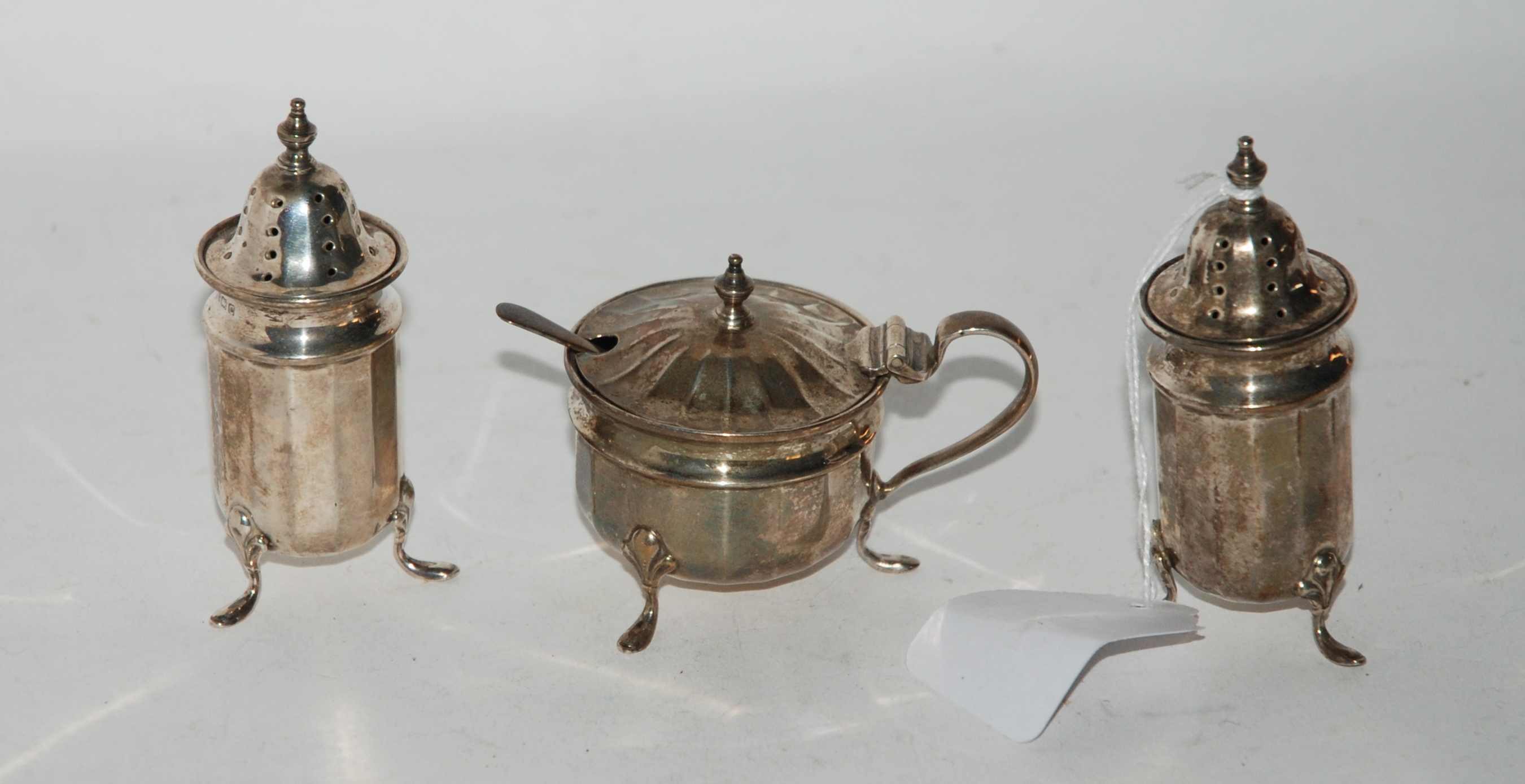 A three piece silver condiment set, Birmingham 1927 Condition Report: Available upon request