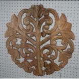 A carved wooden panel, 46 x 46cm Condition Report: Available upon request