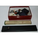 A box of miscellaneous including watch heads, rules, lighters etc Condition Report: Available upon