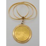 An 18ct gold Italian Napoleon Elba coin in 18ct gold pendant mount, attached to three 18ct gold