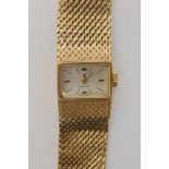 A 9ct gold ladies Omega wristwatch with integral strap, length 17cm, weight including mechanism 30.