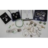 A Swarovski starfish necklace in box, a silver swan necklace and earring set, a mother of pearl