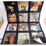 A box of Elvis Presley vinyl LP records with wall hanging frames to include His Hand in Mine with