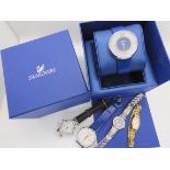 A ladies Swarovski watch in original box, a Le Chat watch, and other examples Condition Report: