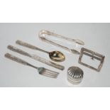 A lot comprising a Chinese white metal knife, fork and spoon and a small white metal frame, a pair