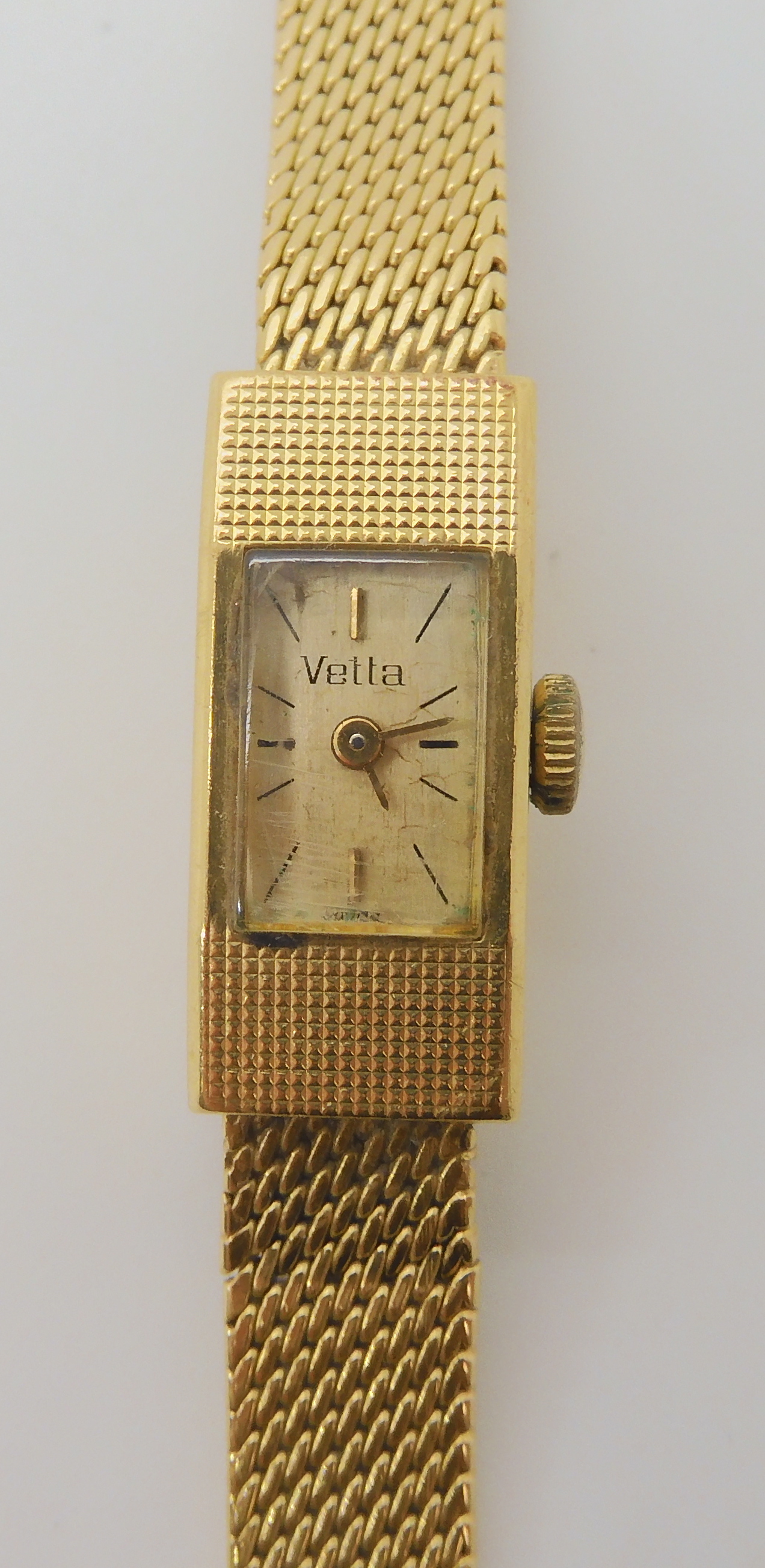 An 18k gold ladies Vetta wristwatch with integral strap, length 17cm, weight including mechanism