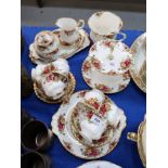 A Royal Albert Old Country Roses, teaset comprising six cups, saucers and plates, cake stand, cake