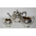 A three piece silver plated tea service Condition Report: Available upon request