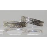 An 18ct white gold diamond eternity ring set with estimated approx 0.40cts of brilliant and baguette