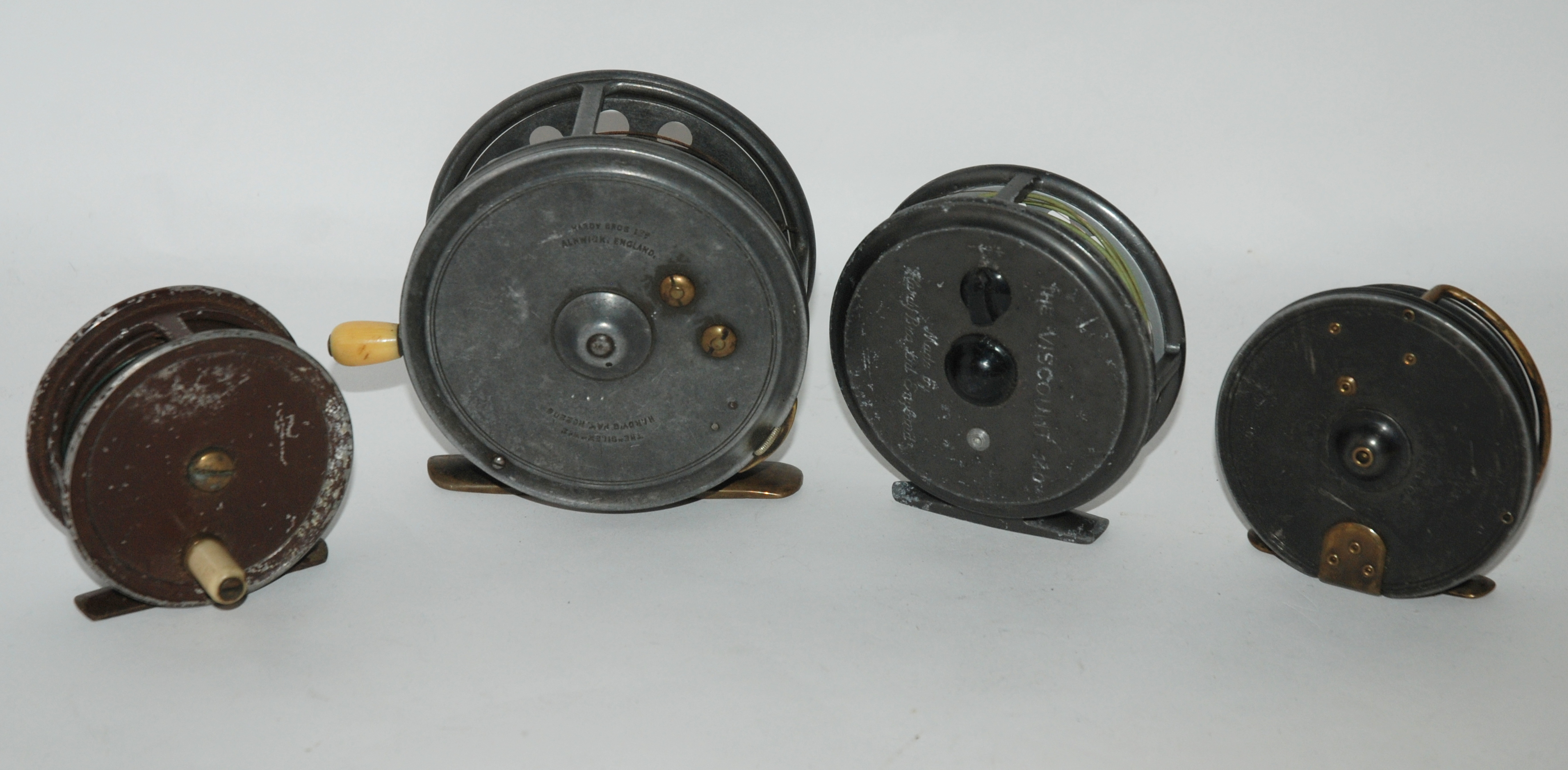 A Hardy Silex No.2 reel, 4. 1/4in, a Hardy Sunbeam, fly reel, 3.1/2in and two other reels (4)