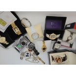 A collection of ladies fashion watches to include a 1g fine gold ingot watch, Ingersoll gems watch