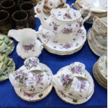 A Hammersley Victorian Violets pattern teaset comprising teapot, six dinner plates, six cups,