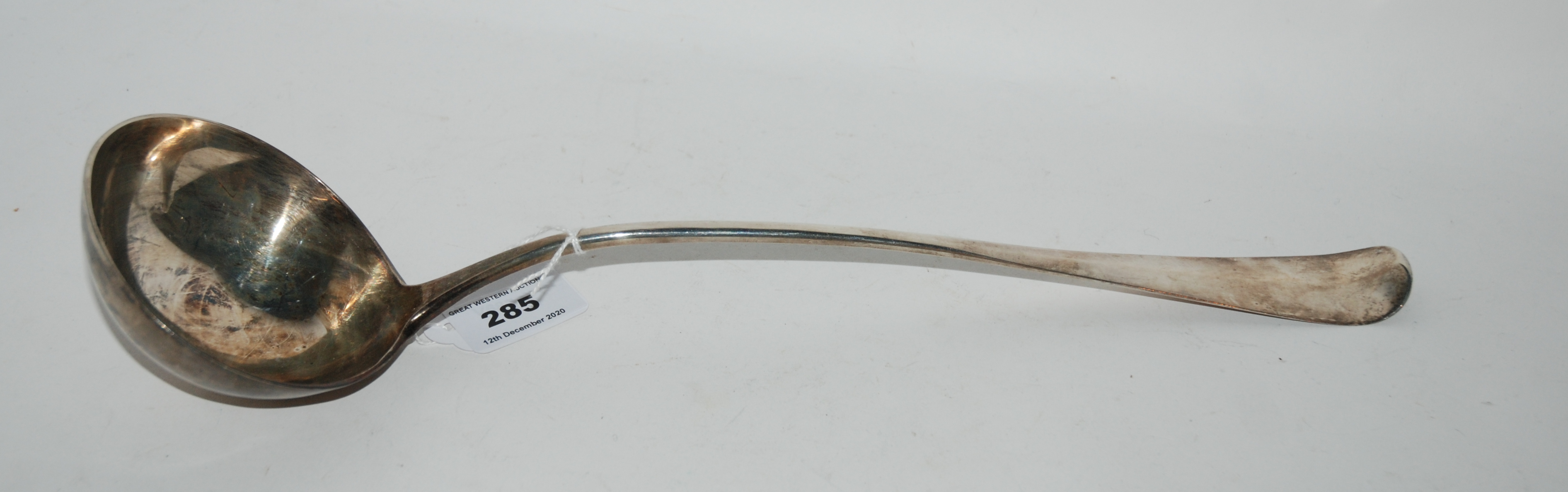 A silver soup ladle, unclear thistle marks, 37cm long, 219gms Condition Report:
