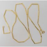 An 18ct gold baton link chain, length 60.5cm, weight 10.4gms Condition Report: Available upon