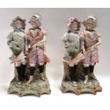 A pair of bisque figures of children Condition Report: One figure has had a head off and re stuck.