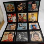 A lot of Elvis Presley vinyl LP records in wall hanging frames to include Double Dynamite, The