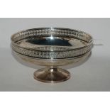 A silver pedestal bowl, Sheffield 1927, circular with pierced decoration, 20.5cm diameter, 388gms