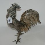 A white metal figure of a cockerel, 31cm high Condition Report: Available upon request