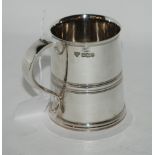 A silver tankard, Sheffield 1960, inscribed "James from Tam 23.3.36 - 61", 9cm high, 311gms