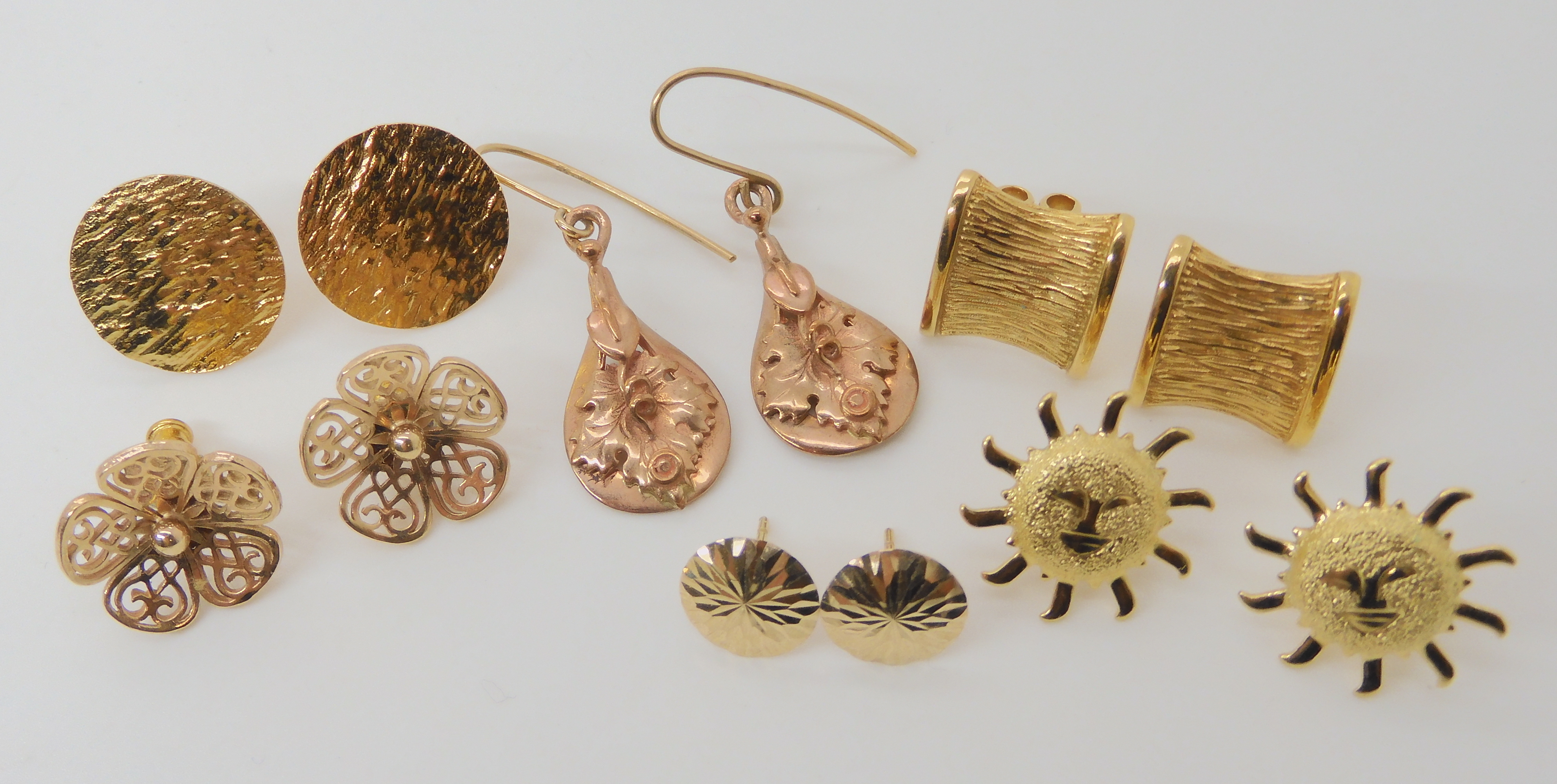 A collection of six pairs of 9ct and yellow metal earrings, approximate weight 14gms Condition - Image 2 of 2