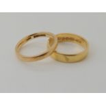 An 18ct gold Victorian wedding ring dated Chester 1882, size L1/2, weight 3.8gms, together with a