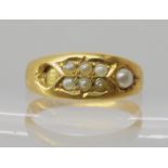 A Victorian 18ct gold pearl set ring, hallmarked Birmingham 1887, (one pearl missing) size P, weight