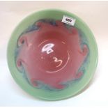 A Vasart glass bowl, the pink centre with swirling blue and green rim, 25cm diameter Condition