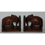 A tray lot including carved elephant bookends, boxes etc Condition Report: Available upon request