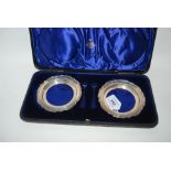 A cased pair of silver dish frames, Birmingham 1930, 11.5cm diameter, 114gms Condition Report: