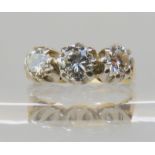 A three stone diamond ring set with estimated approx 0.80cts of brilliant cut diamonds, mounted in