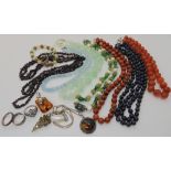 A collection of gem stone beads, to include green fluorite, lapis lazuli, garnet and other items