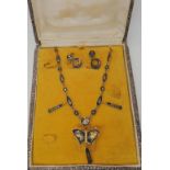 A boxed set of Japanese Damascene wear necklace and earrings Condition Report: Not available for